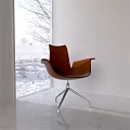 White Background Wall With Brown Chair And Window Showing Snowy Field View