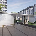 Modern Entrance Gate With Paved Walkway And Green Landscaping Near Apartment Buildings