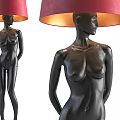 Abstract Black Figurine Floor Lamp With Red Lampshade And Warm Yellow Light