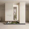 White Modern Room Divider With Illuminated Niche And Small Garden Stones