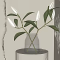 Clear Glass Vase With White Flower Buds And Green Leaves On White Pedestal Natural Light