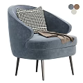 Beige Accent Chair with Black White Houndstooth Cushion and Brown Throw on Black Slender Legs