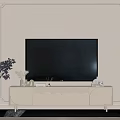 Modern White TV Stand With Scallop Doors And Decorative Items On Beige Wall
