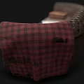 Vintage Tufted Leather Double Sofa With Book Newspapers And Red Plaid Blanket