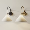 Pair of Black and Gold Modern Wall Lamps with White Conical Shades on Beige Wall