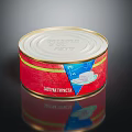 Canned Coconut Food Product With Red Label And White Contents Packaging
