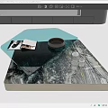 Modern Coffee Table With Green Glass And Marble Top Featuring Magazines And Bowl