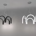 Two Unique Shaped Pendant Lights In Black And White With Metal Frames And Modern Design