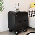 Modern Black Console Side Cabinet with Drawers and Top Lamp and Books Near Sofa Plant
