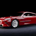 Red Sports Car With Modern Sleek Design Streamlined Body And Silver Alloy Wheels
