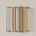 Modern Metal Door Handles in Silver Copper and Gold Tones Arranged on Light Background
