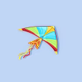 Bright Colorful Kite Flying High In Clear Blue Sky With Long Tail