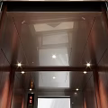 Modern Public Elevator With Wooden Paneling Floor Indicator And Control Panel 3d model