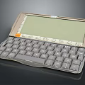 Handheld Portable Computer With Green LCD Screen And Gray QWERTY Keyboard