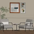Gray Accent Chairs With Metal Armrests Small Round Table Books Beige Wall Framed Artworks