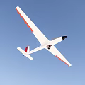 Passenger Airplane With White Body Red Stripes On Wings And Black Nose
