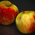 Fresh Red And Yellow Apples With Natural Speckles On Dark Background