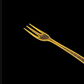 Modern Cutlery Set Featuring Shiny Stainless Steel Fork On Blue Surface