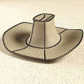 Beige Cowboy Hat With Black Stitching Detail On Light Fabric Surface