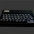 Classic Black Microdata Terminal Electronic Device With Colored Keys And Keyboard