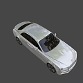Elegant Silver Luxury Sedan With Sleek Body Design And Large Alloy Wheels