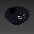 Contemporary Decorative Ornament Set Featuring Silver Metal Sculptural Piece and Black Marble Decorative Stone on Black Circular Tray