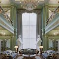 Luxurious Duplex Living Room With Green Walls Large Window Chandelier And White Statues