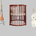 Wooden Baby Crib With Curved Railings White Mattress White Floor Lamp And White Rabbit Decoration