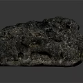 Unique Natural Dark Gray Stone Ornament With Porous Surface And Rough Texture