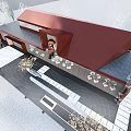 Sales office building with modern red roof design and outdoor area surrounded by trees