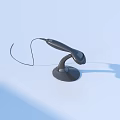 Practical Black Fixed Telephone Handset With Curved Cord And Base On Light Blue Background 3d model