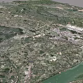 Aerial Planning of Urban Area with River Flowing Through Surrounded by Mountains and Green Spaces