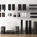 Various Types of Headphones and Speakers with Modern Design Displayed on Wall and Wooden Floor