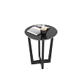 Round Black Coffee Table With Modern Geometric Legs Featuring A Mug And Open Magazine 3d model