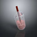Transparent Plastic Cup With Red Straw And Pink Bubbly Beverage Inside
