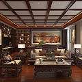 Chinese Style Office Interior Featuring Dark Wooden Furniture Fish Tank Tea Set And Green Plants