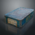 Vintage Decorative Ornament Combination With Blue Green Distressed Metal Box And Retro Labels