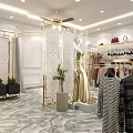 Stylish Clothing Store Interior With Chandelier Fan Racks Clothes White Display Tables And Marble Flooring
