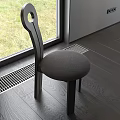 Stylish Single Chair With Gray Cushion By Window On Wooden Floor