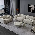 Modern Living Room Beige Sofa And Round Coffee Table Set With Rug And Fireplace