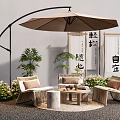 Outdoor Rattan Table And Chair Set With Umbrella Plants And Decorative Screen