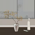 Golden Leaves Branch In Textured Vase With White Sculptural Bottle On Wooden Floor