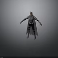 Man Dressed As Batman In Gray And Black Costume With Cape And Utility Belt