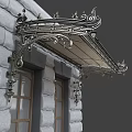 Ornate Iron Awning With Intricate Designs Mounted On Stone Wall Above Windows