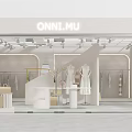 Elegant Modern Clothing Storefront With Window Display Mannequins And Dresses