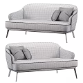 Modern Gray Sofa Design With Checkered And Orange Pillows And Metal Legs