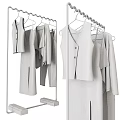 Various Light Colored Clothes Hanging On Metal Hangers With Different Styles 3d model