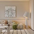 Modern Cream Toned Living And Dining Room With Plush Sofa And Beautiful Abstract Wall Art