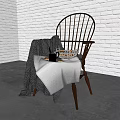Wooden Armchair With Knitted Blanket Tray And Mug Against White Brick Wall