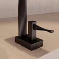 Stylish Faucets with Different Finishes on Light Gray Countertop and Beige Wall